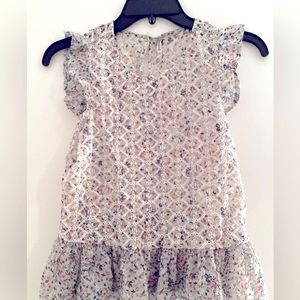 Sleeveless flare blouse